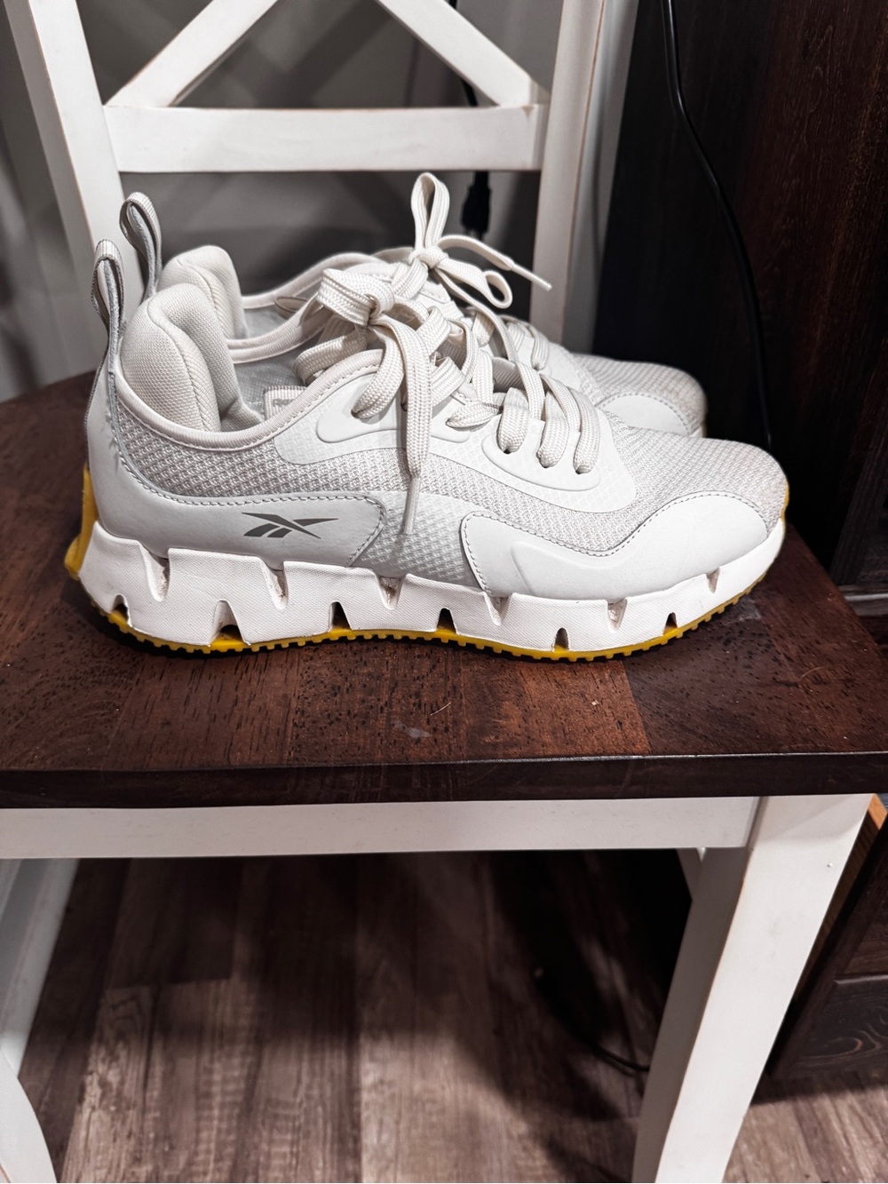 Reebok Women’s White Sneakers with Yellow Outsole Accents